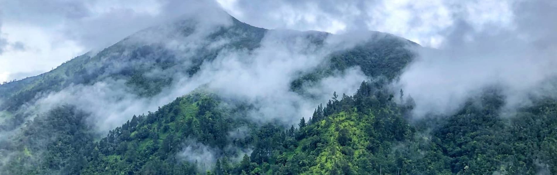 How the Blue Mountains Protect Jamaica, Where to Buy Weed in Jamaica, Image of Blue Mountains with clouds