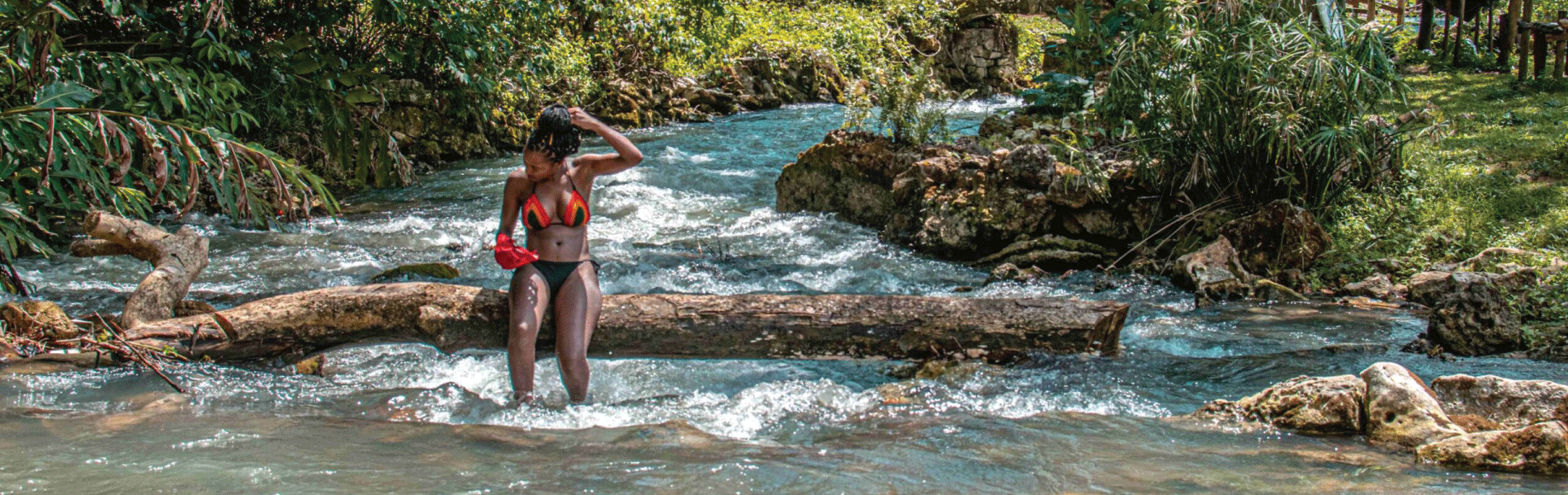 roaring river jamaica, best weed in negril, image of a woman at the river